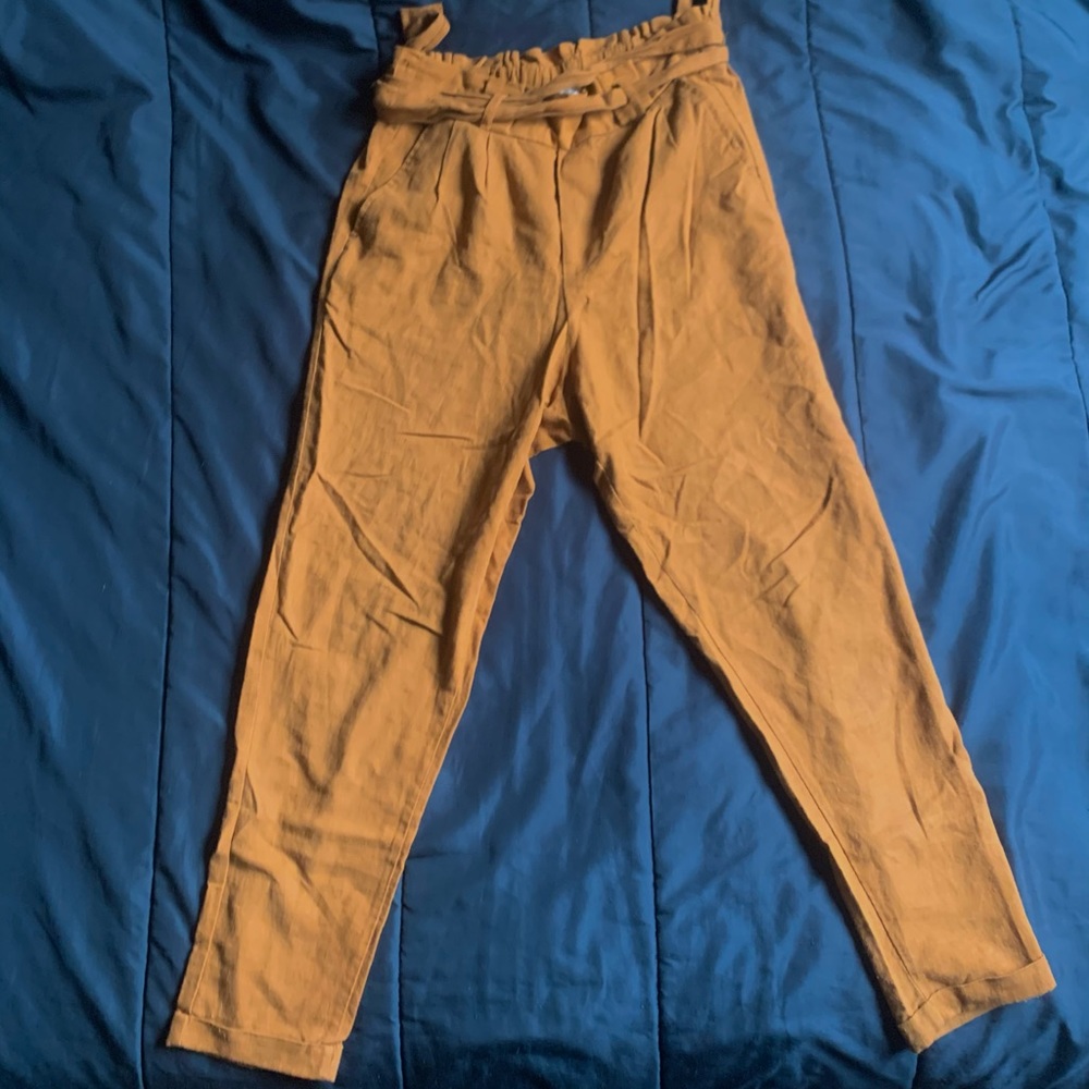 Pleated pants.